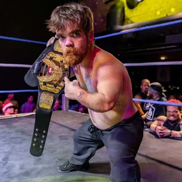midget wrestler with title belt